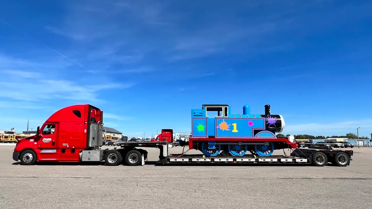 Roehl Dedicated transportation services pulling Thomas the Tank Engine