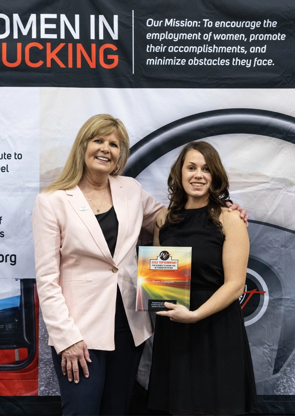 Roehl's Director of HR Accepting a Women In Trucking Association Award